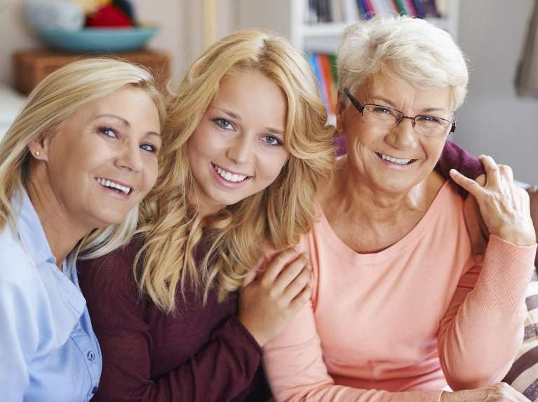 three generation of women hugging | dentist lara vic